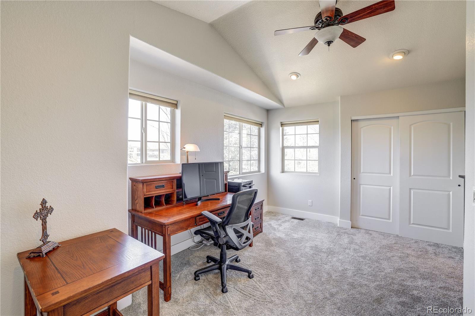 4530 Quitman Street Denver, CO 80212 - Photo 25 of 40 a workspace with furniture and a window