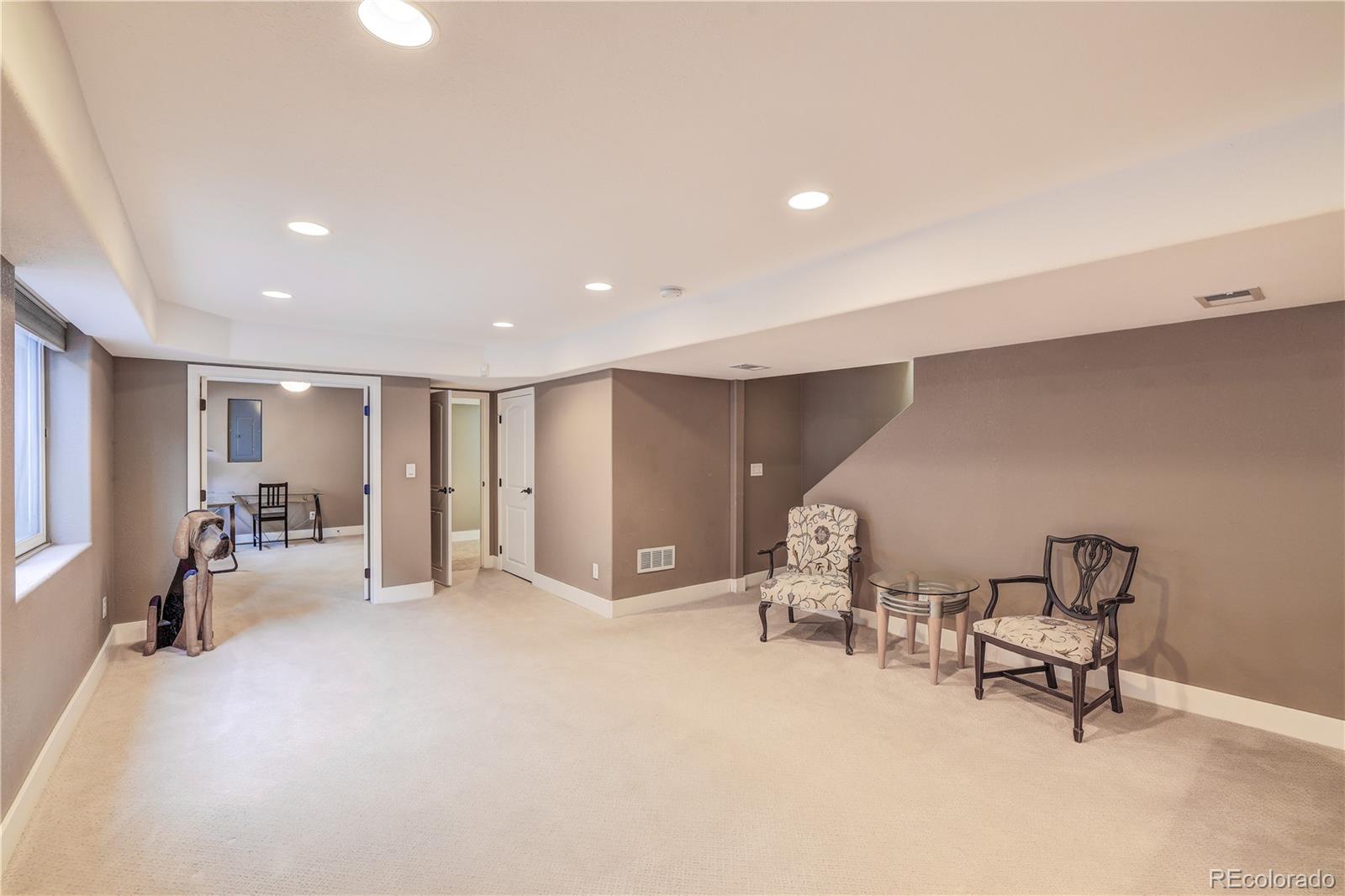 4530 Quitman Street Denver, CO 80212 - Photo 30 of 40 a view of a livingroom with furniture and a chair