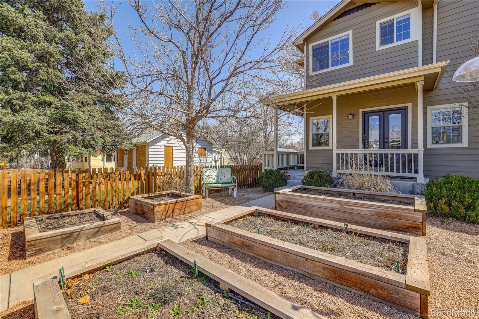 4530 Quitman Street Denver, CO 80212 - Photo 3 of 40 a view of a house with backyard and sitting area
