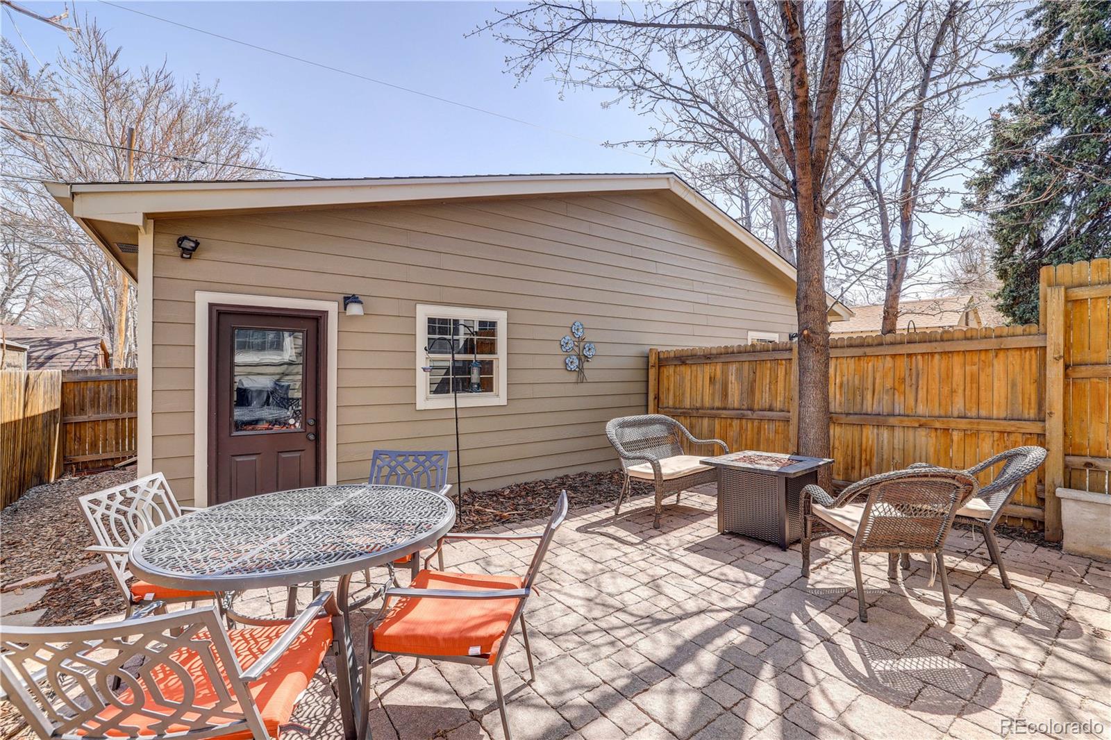 4530 Quitman Street Denver, CO 80212 - Photo 35 of 40 a backyard of a house with table and chairs