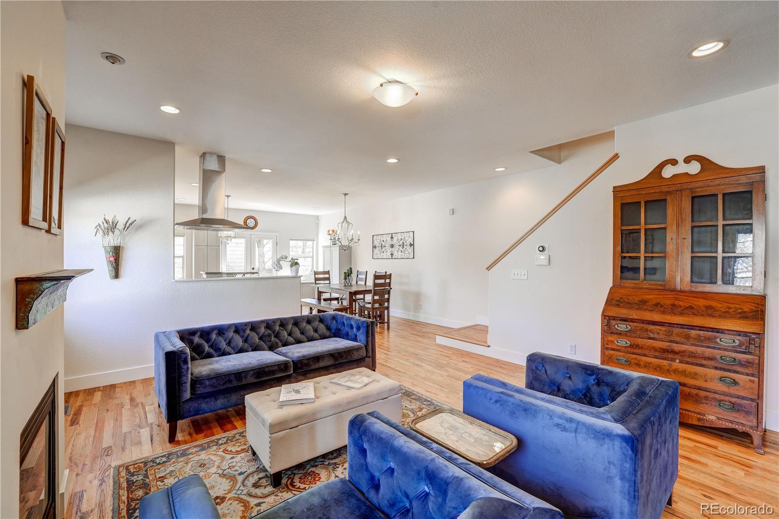 4530 Quitman Street Denver, CO 80212 - Photo 7 of 40 a living room with furniture and wooden floor