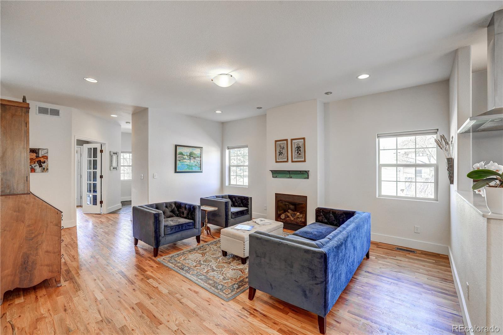 4530 Quitman Street Denver, CO 80212 - Photo 9 of 40 a living room with furniture and a wooden floor