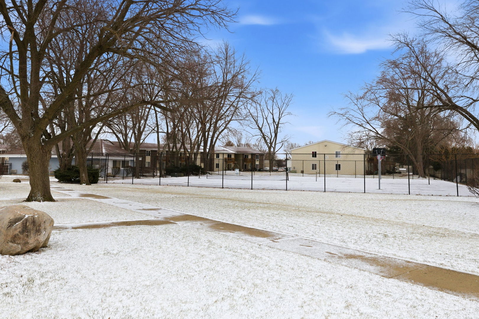 2800 Light Road, Unit 102 Oswego, IL 60543 - Photo 12 of 12 a view of road with trees