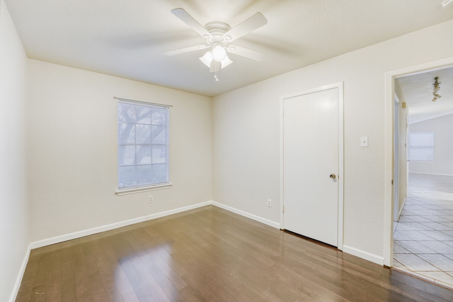 9100 Wagtail Drive Austin, TX 78748 - Photo 12 of 23 Bedroom with light wood-style floors and a ceiling fan.