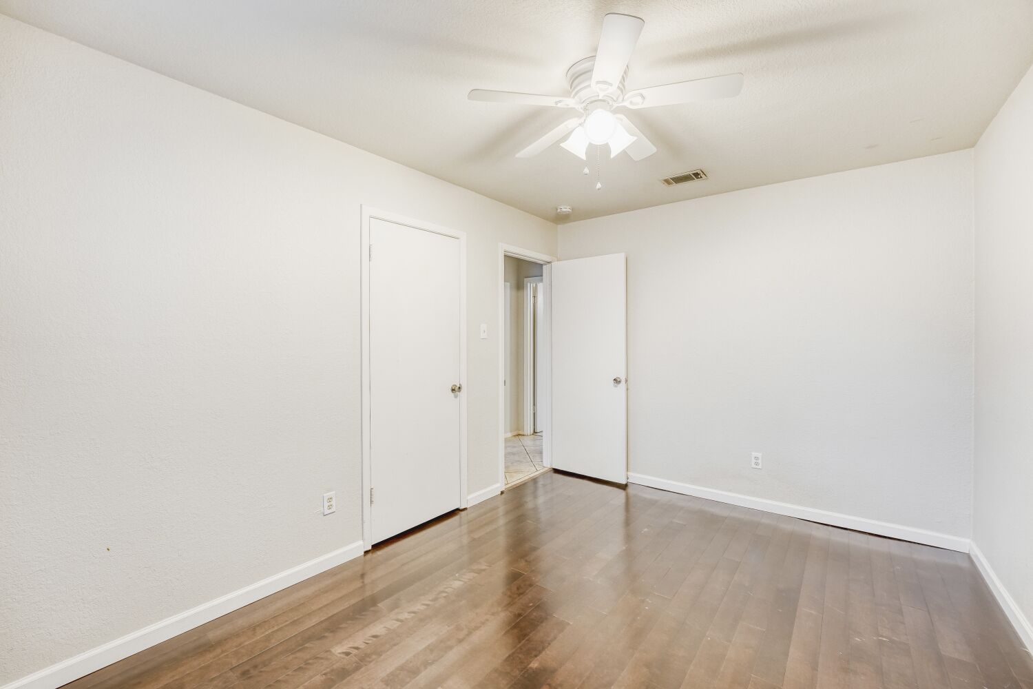 9100 Wagtail Drive Austin, TX 78748 - Photo 13 of 23 Bedroom featuring ceiling fan and light wood-type flooring