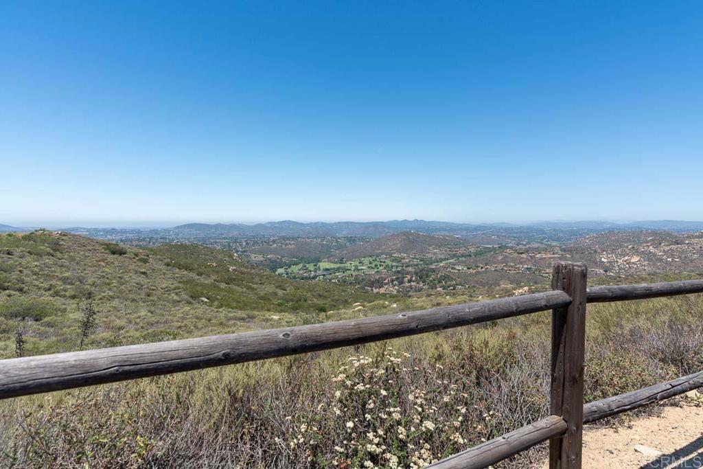 18055 Sunset Point Poway, CA 92064 - Photo 28 of 39 a view of city and mountain from a balcony
