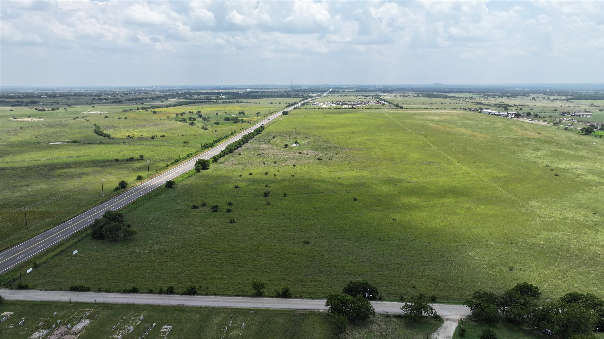 0 Tbd Highway Bertram, TX 78605 - Photo 2 of 11 a view of a lake with a big yard