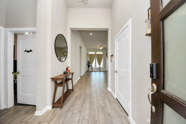 a kitchen with a table and chairs in it