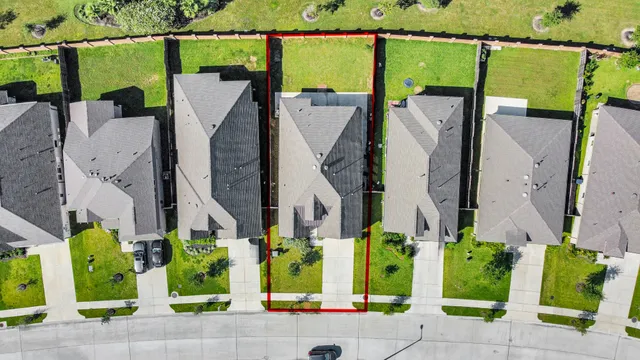 an aerial view of a house with garden