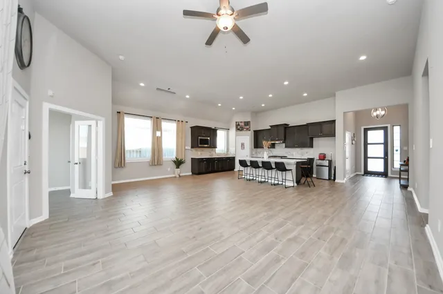 a view of a storage & utility room with two washing machine