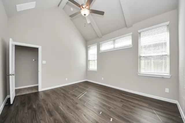 a view of bathroom with a tub shower sink vanity and a toilet