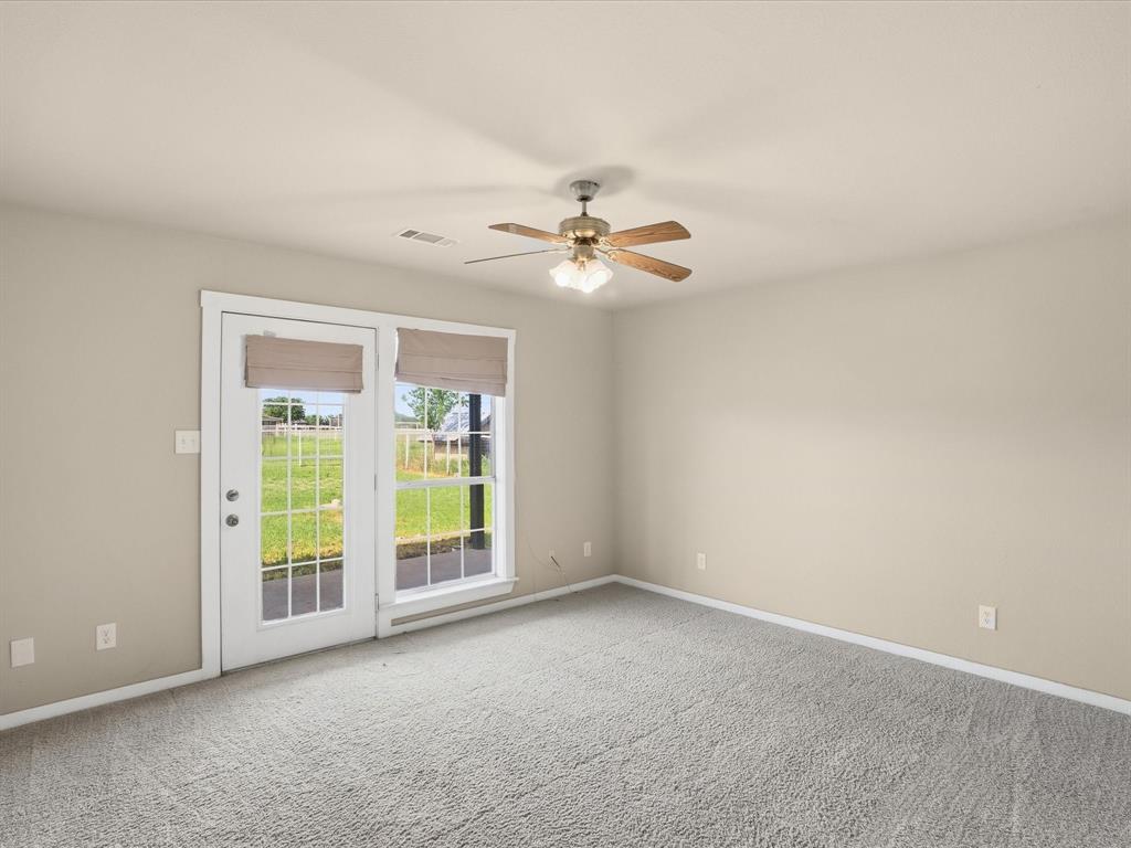 6568 Michael Road Sanger, TX 76266 - Photo 19 of 33 a view of an empty room with a window