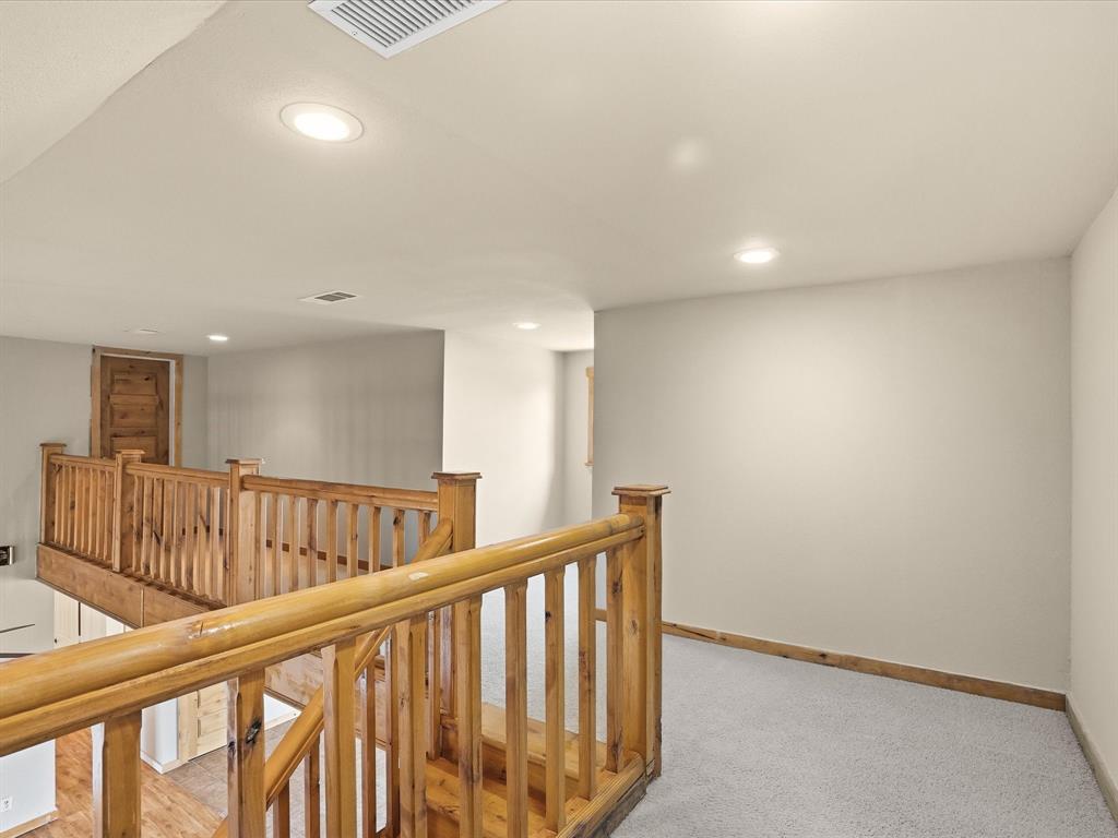 6568 Michael Road Sanger, TX 76266 - Photo 22 of 33 a view of hallway with wooden floor