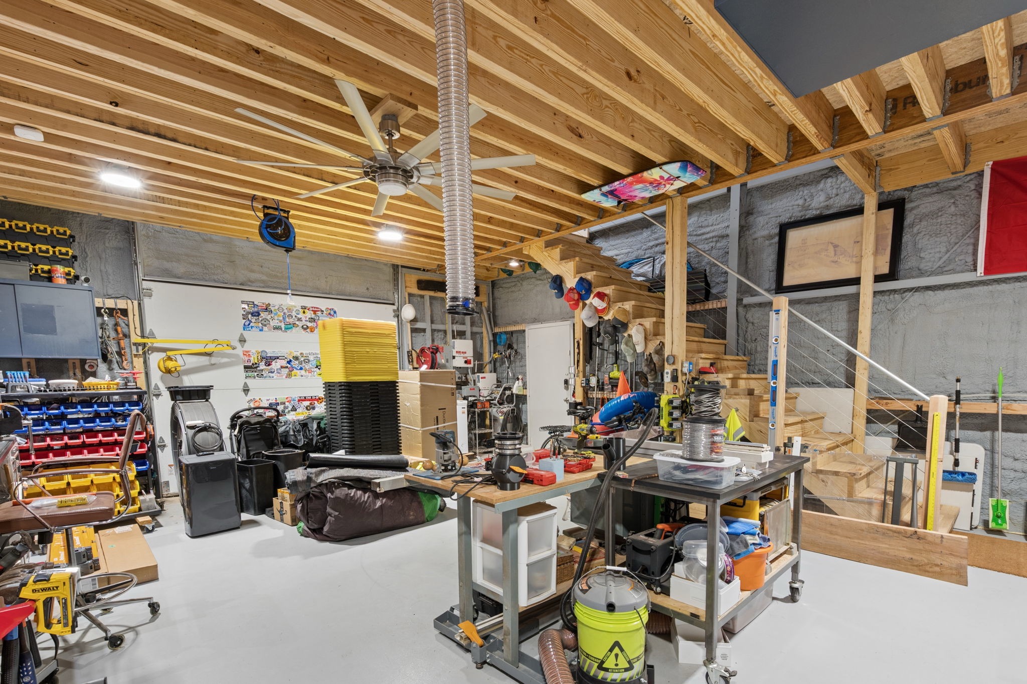 534 Old McDade Road Elgin, TX 78621 - Photo 38 of 40 View of the workshop, with door on left and stairs to a second story space. Workshop can easily work as a garage space if it is preferable.