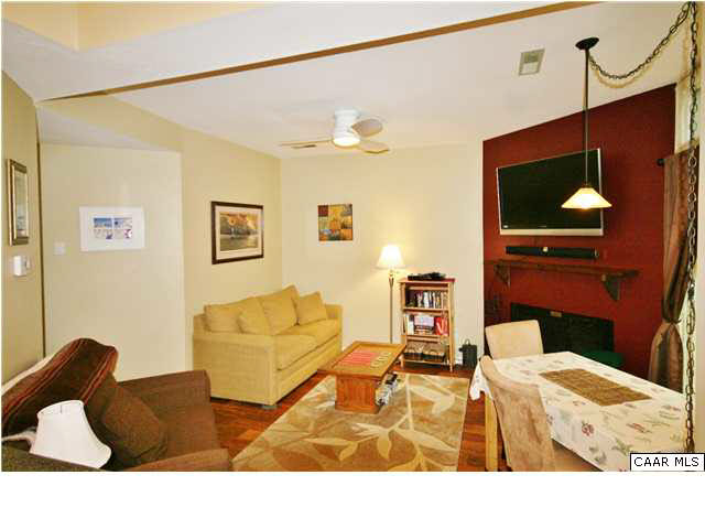 456 Three Ridges Roseland, VA 22967 - Photo 4 of 8 a living room with furniture and a flat screen tv