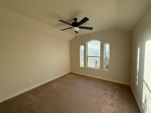 6933 Spring Wind Corpus Christi, TX 78413 - Photo 8 of 11 an empty room with a window and a ceiling fan