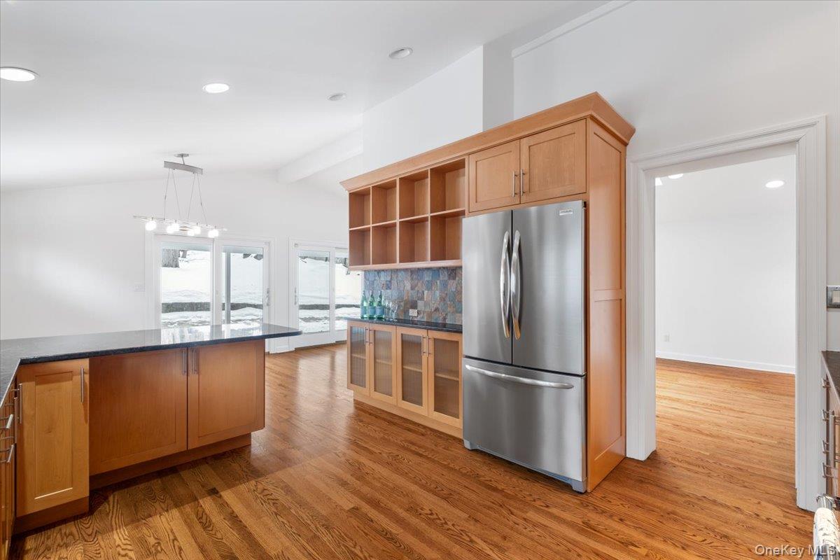 9 Tanglewood Road Scarsdale, NY 10583 - Photo 18 of 33 a kitchen with stainless steel appliances granite countertop a refrigerator and a stove top oven