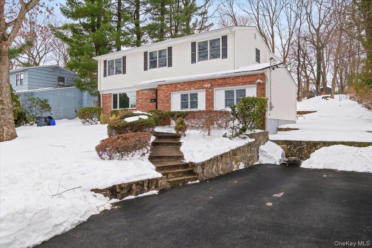 9 Tanglewood Road Scarsdale, NY 10583 - Photo 2 of 33 a view of a house with a yard