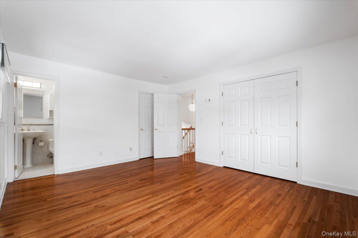 9 Tanglewood Road Scarsdale, NY 10583 - Photo 24 of 33 a view of empty room with wooden floor