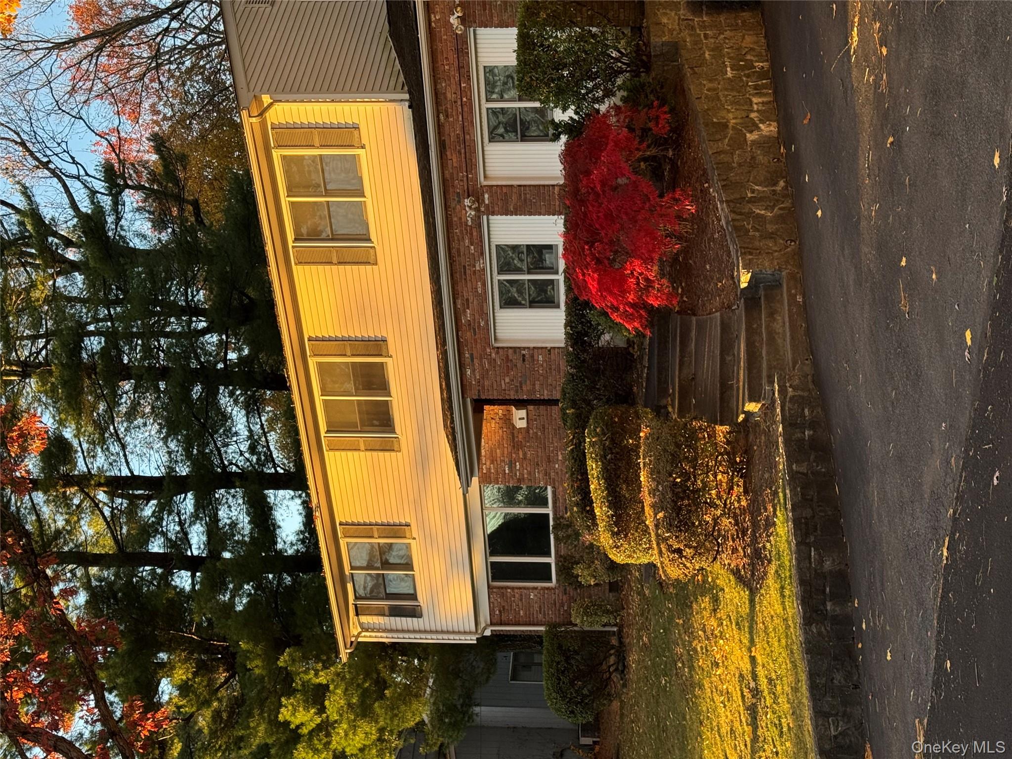 9 Tanglewood Road Scarsdale, NY 10583 - Photo 3 of 33 a front view of a house with garden