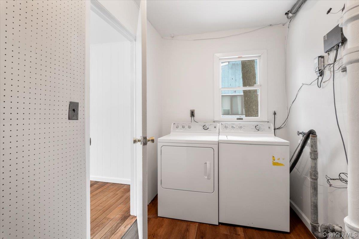 9 Tanglewood Road Scarsdale, NY 10583 - Photo 7 of 33 a utility room with dryer and washer