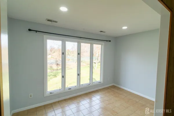a view of empty room with window