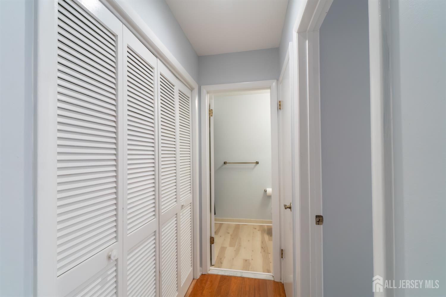 166 Hidden Hollow Court Edison, NJ 08820 - Photo 16 of 36 a view of a bathroom from the hallway