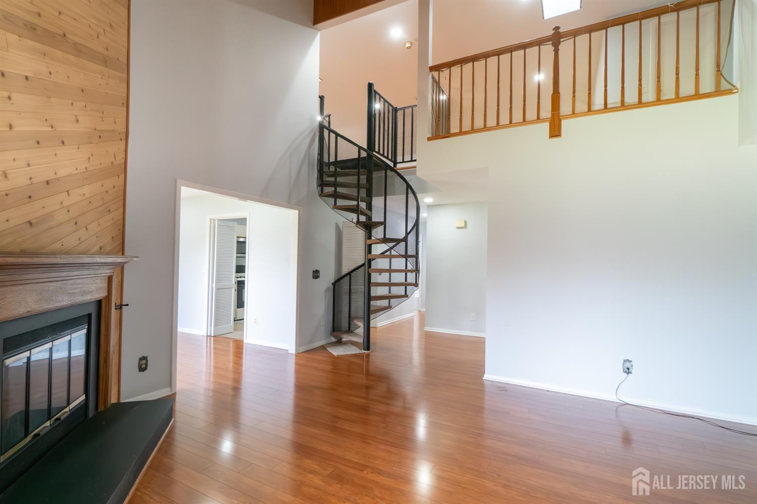 166 Hidden Hollow Court Edison, NJ 08820 - Photo 9 of 36 a view of entryway with wooden floor