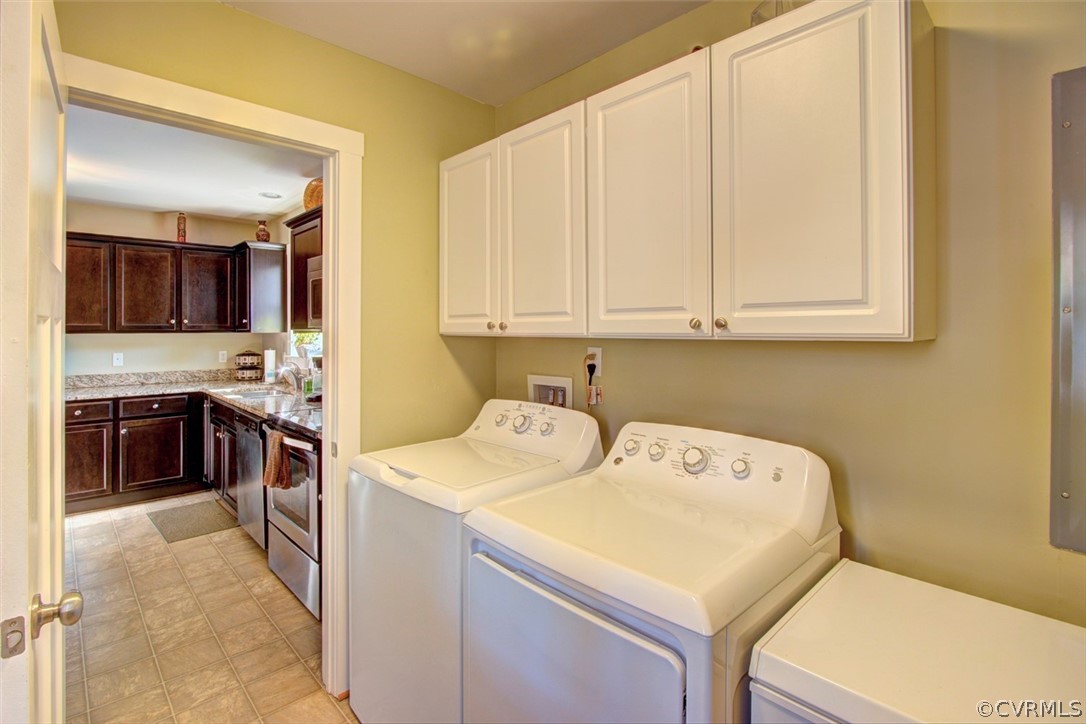 355 Manchester Road Bumpass, VA 23024 - Photo 20 of 43 Spacious utility room with cabinets. Enter from t