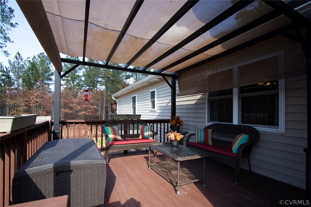 355 Manchester Road Bumpass, VA 23024 - Photo 21 of 43 Back deck with arbor.