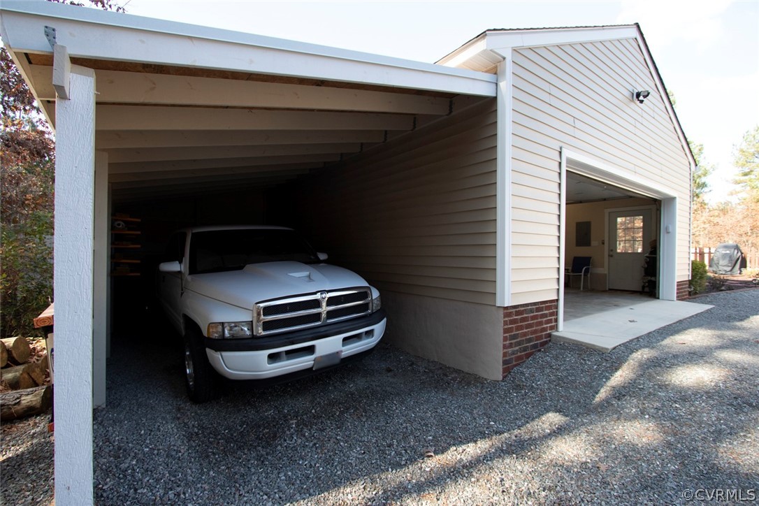 355 Manchester Road Bumpass, VA 23024 - Photo 24 of 43 Carport can fit a large truck. This one is over 8