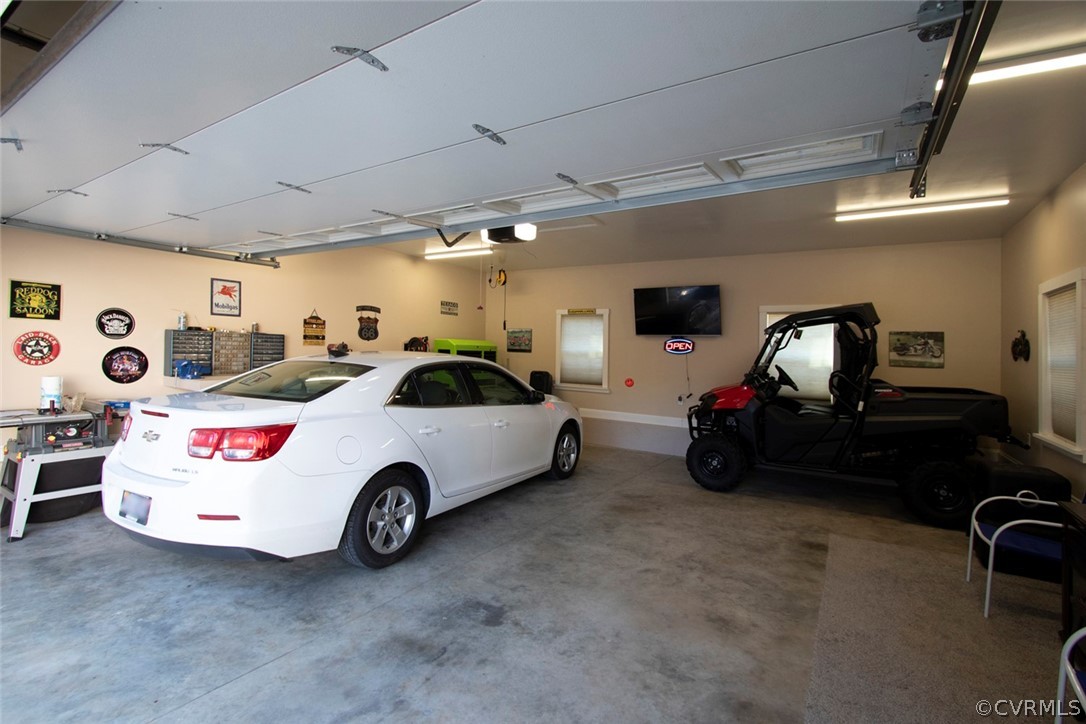 355 Manchester Road Bumpass, VA 23024 - Photo 25 of 43 Plenty of room in the garage for work area, cars a
