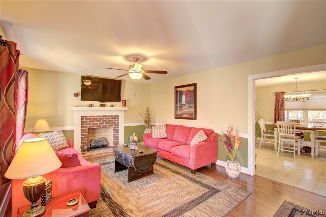 355 Manchester Road Bumpass, VA 23024 - Photo 3 of 43 Living room with hardwood floors, gas fireplace an
