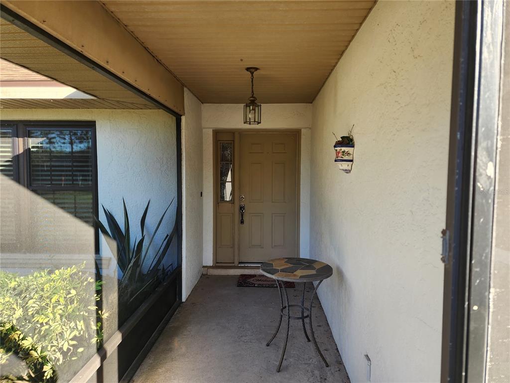 11759 Oswalt Road Clermont, FL 34711 - Photo 2 of 24 a bathroom with a sink a mirror and a shower
