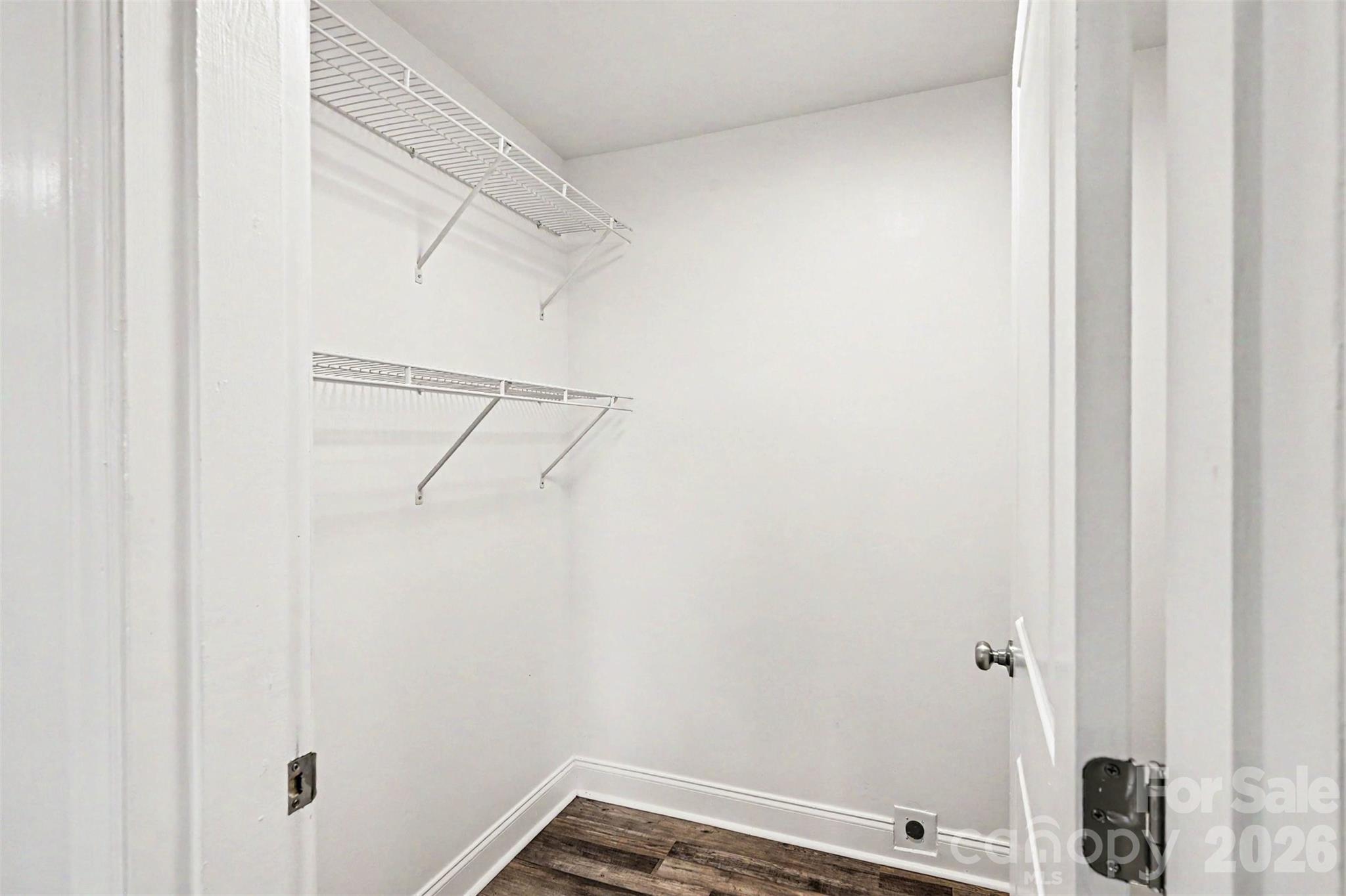 405 Aquadale Road Albemarle, NC 28001 - Photo 21 of 29 a view of a room with racks on the wall