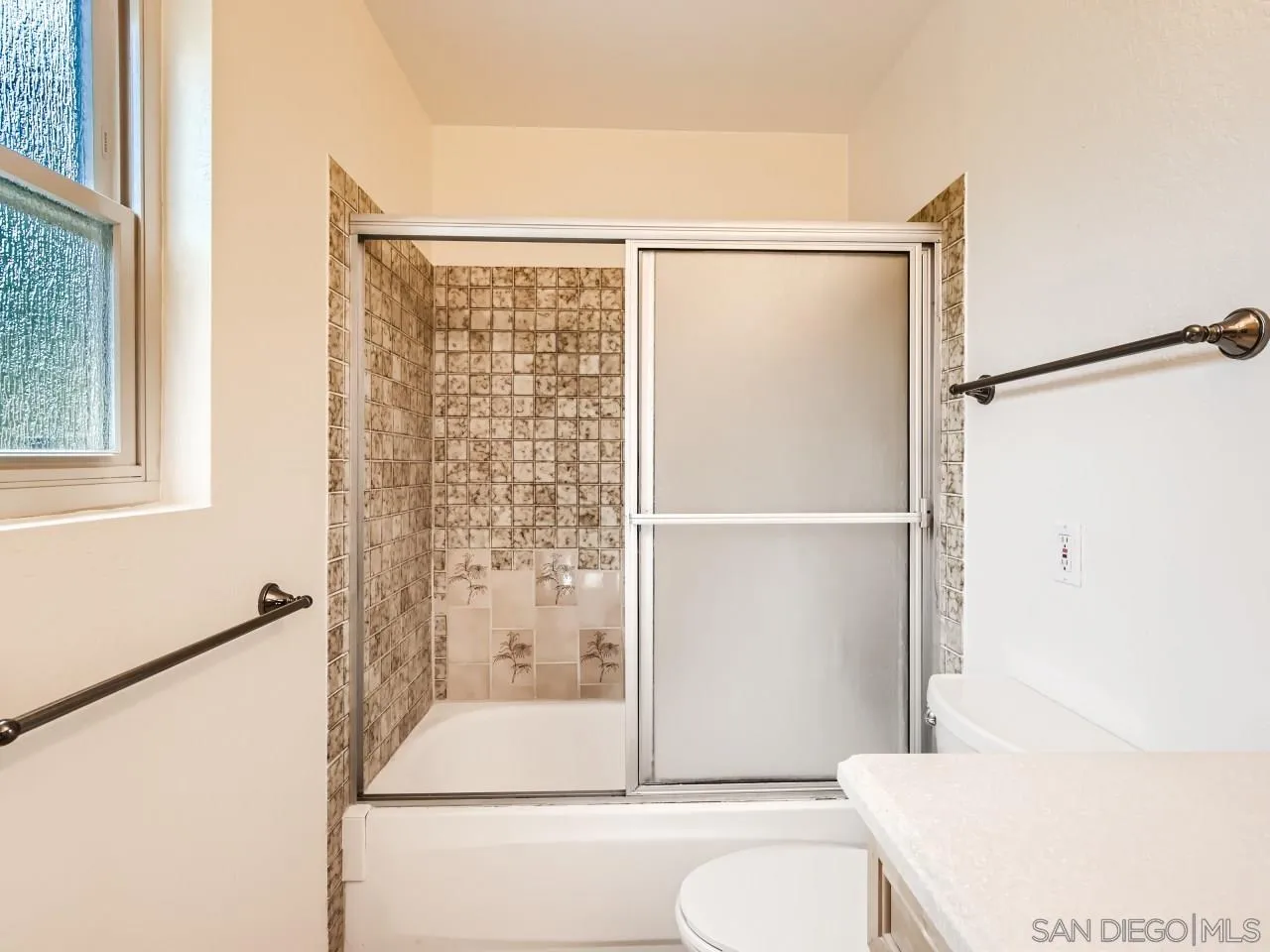 124 Candy Lane Encinitas, CA 92024 - Photo 19 of 27 a bathroom with a granite countertop sink toilet and shower