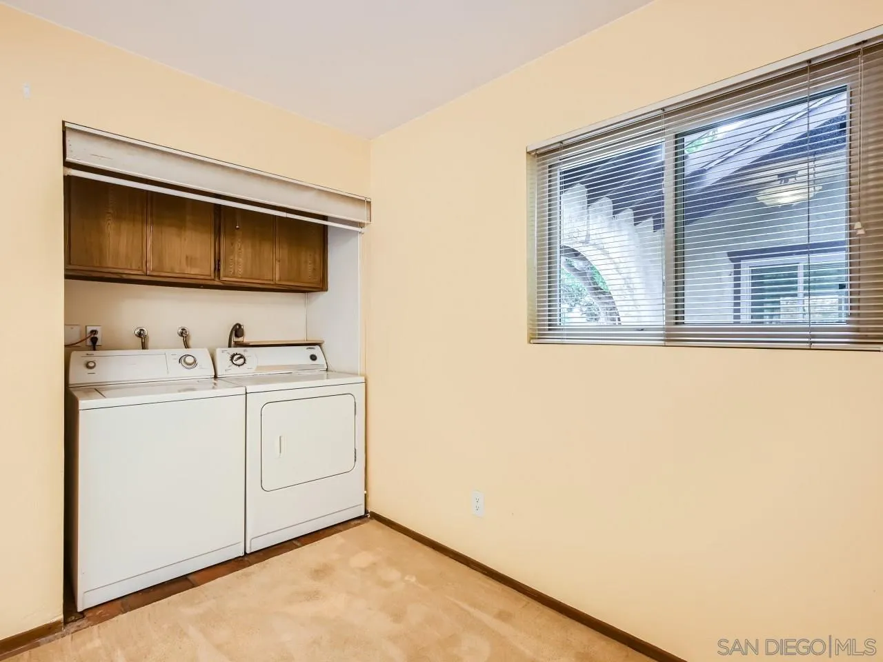 124 Candy Lane Encinitas, CA 92024 - Photo 23 of 27 a utility room with dryer and washer