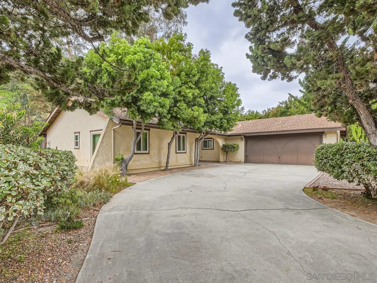124 Candy Lane Encinitas, CA 92024 - Photo 3 of 27 front view of a house with a street