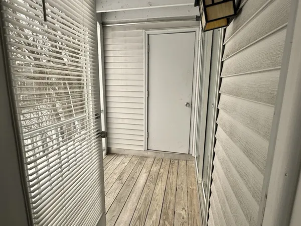 a view of a house with a tub and stairs