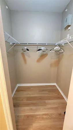 a view of a room with racks on the wall