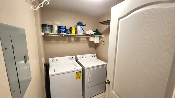 a utility room with dryer and washer
