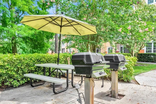 a view of outdoor sitting space with backyard