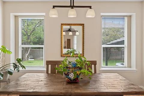 a vase of flowers sitting on a table