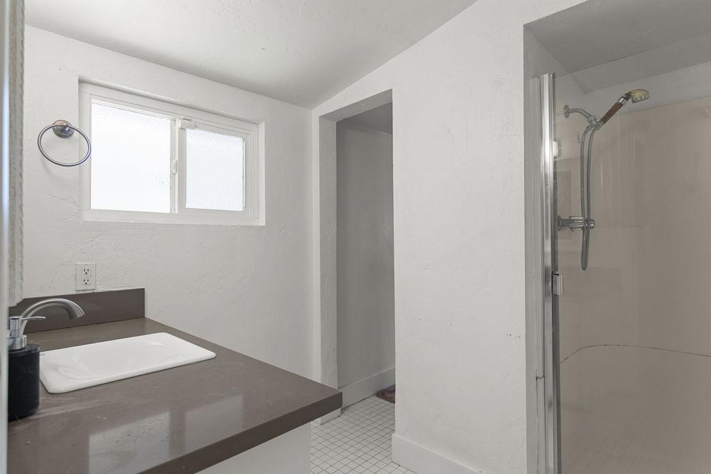 18110 4th Avenue Jamestown, CA 95327 - Photo 31 of 37 a bathroom with a sink and a mirror