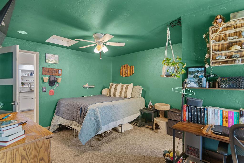 18110 4th Avenue Jamestown, CA 95327 - Photo 33 of 37 a bedroom with a bed table and chair