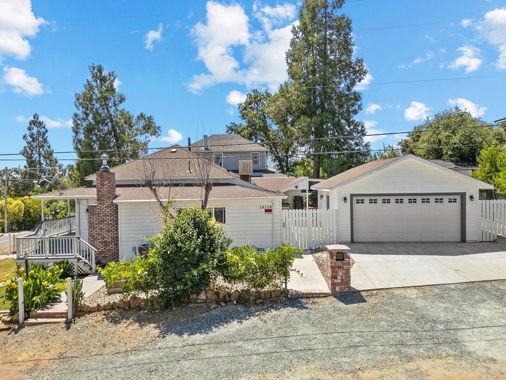 18110 4th Avenue Jamestown, CA 95327 - Photo 7 of 37 a view of a house with a yard and large tree