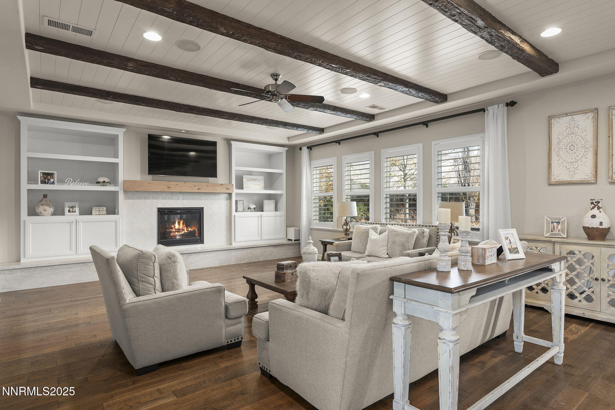 9890 Kerrydale Court Reno, NV 89521 - Photo 14 of 48 a living room with furniture fireplace and a large window