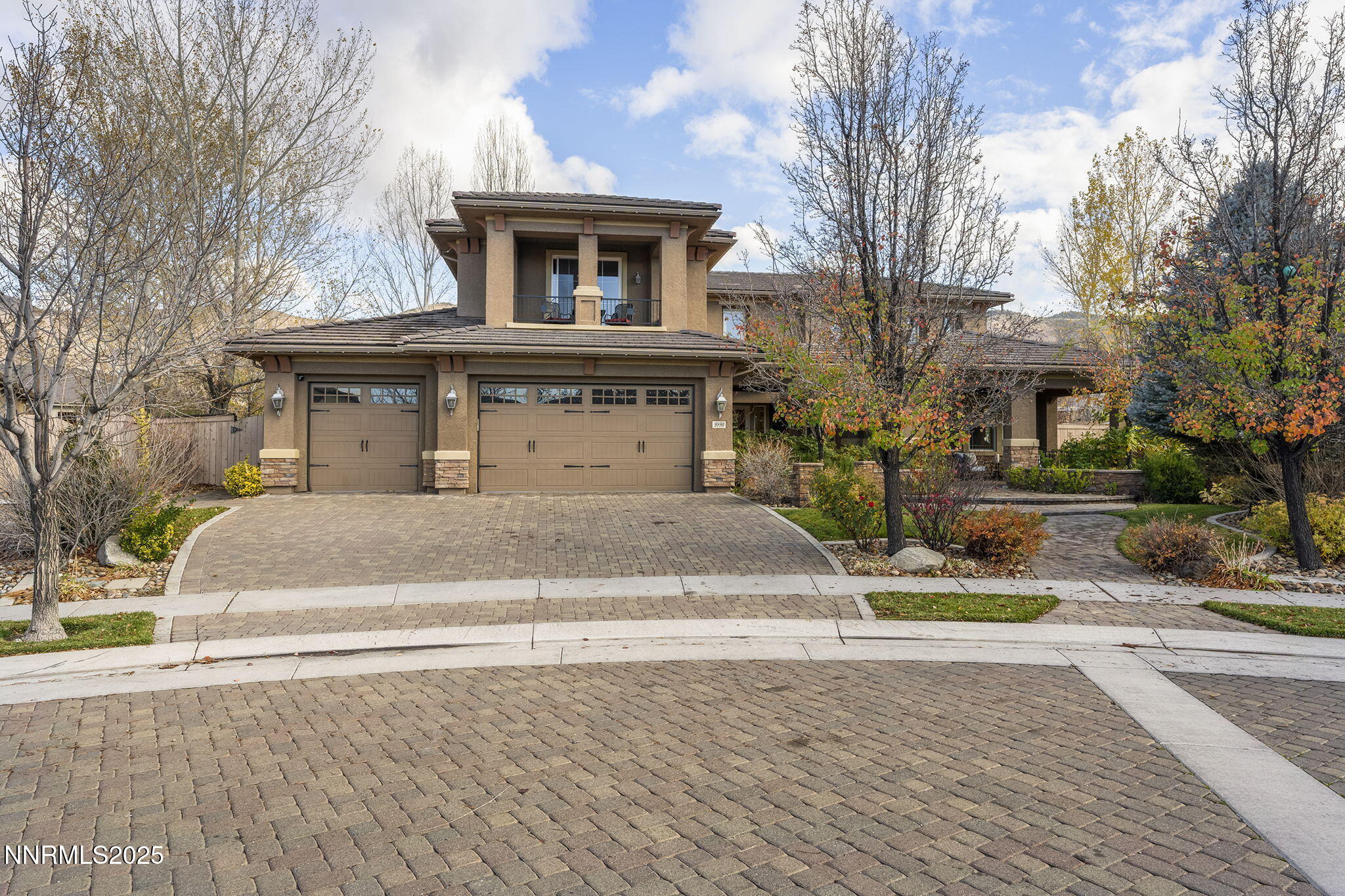 9890 Kerrydale Court Reno, NV 89521 - Photo 2 of 48 a front view of a house with a garden
