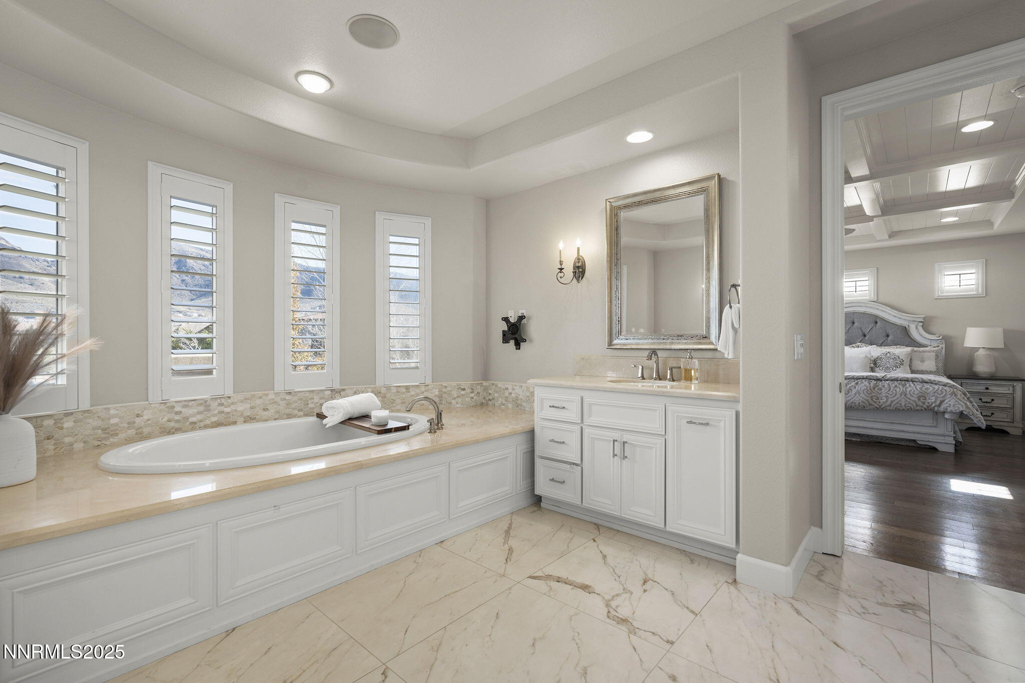 9890 Kerrydale Court Reno, NV 89521 - Photo 24 of 48 a spacious bathroom with sinks mirror and a bathtub