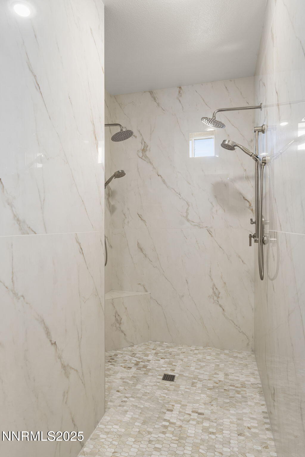 9890 Kerrydale Court Reno, NV 89521 - Photo 27 of 48 a bathroom with a shower